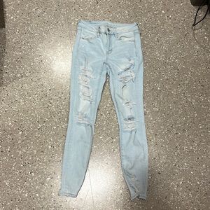 light wash ripped skinny jeans
